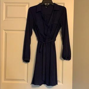 Navy blue dress with tie waist.